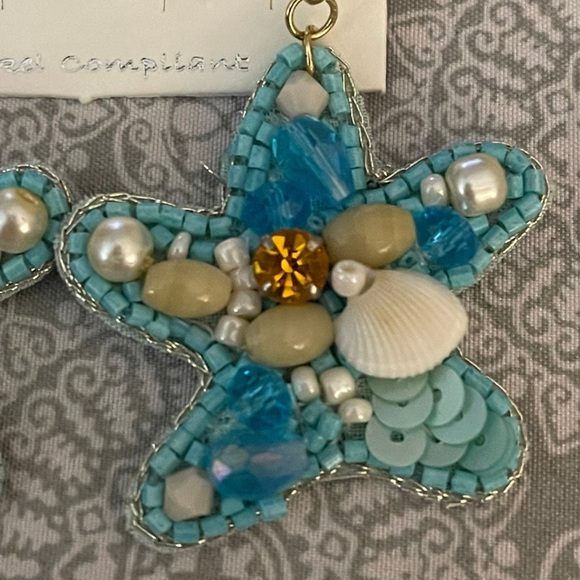 Blue starfish embellished earrings
Seed beads, pearls, jewels, seashells - Picture 4 of 4